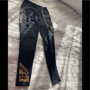 black and gold virus leggings